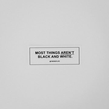 Text on sticker: Most things aren't black and white